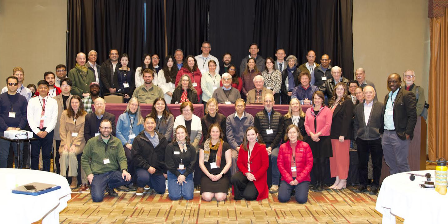 compressed_symposium_group_photo.png