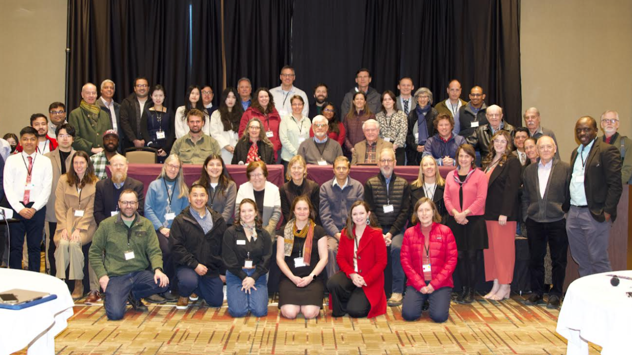 compressed_symposium_group_photo.png